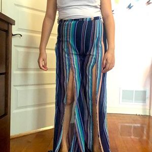 Wide legged stripped pants with two slits